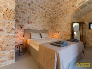 foto immobile Elegante Villa con Piscina e Dependance in Trulli a Ostuni n. 18