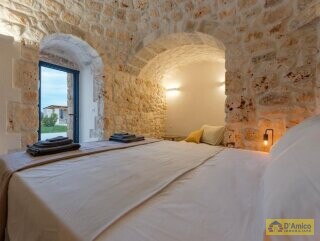 foto immobile Elegante Villa con Piscina e Dependance in Trulli a Ostuni n. 19